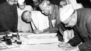 The Constitution of India being signed by Members of the Constituent Assembly in January 1950. | Photo Credit: The Hindu Archives